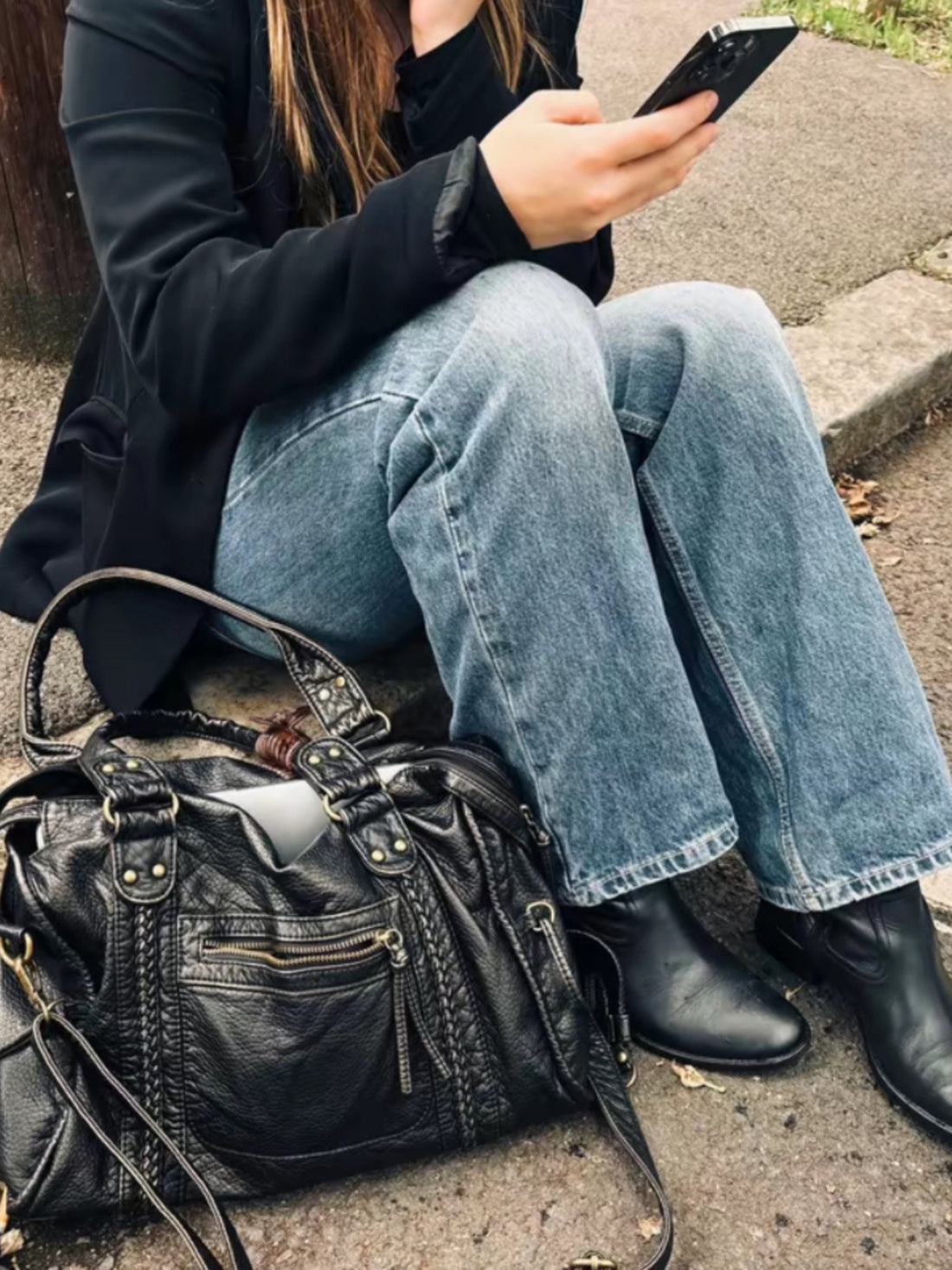Black Leather Shoulder Bag with Braided Trim and Side Ties