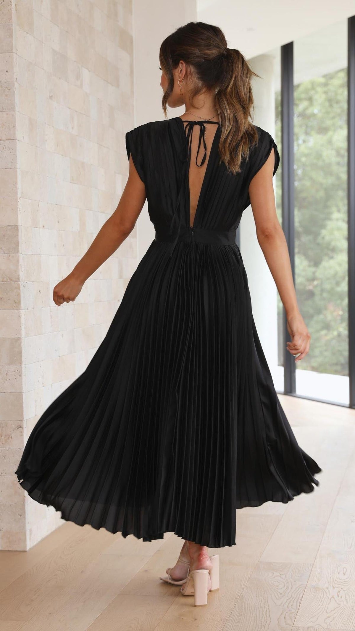 Elegant Pleated Midi Dress with Deep V-Neckline and Satin Finish