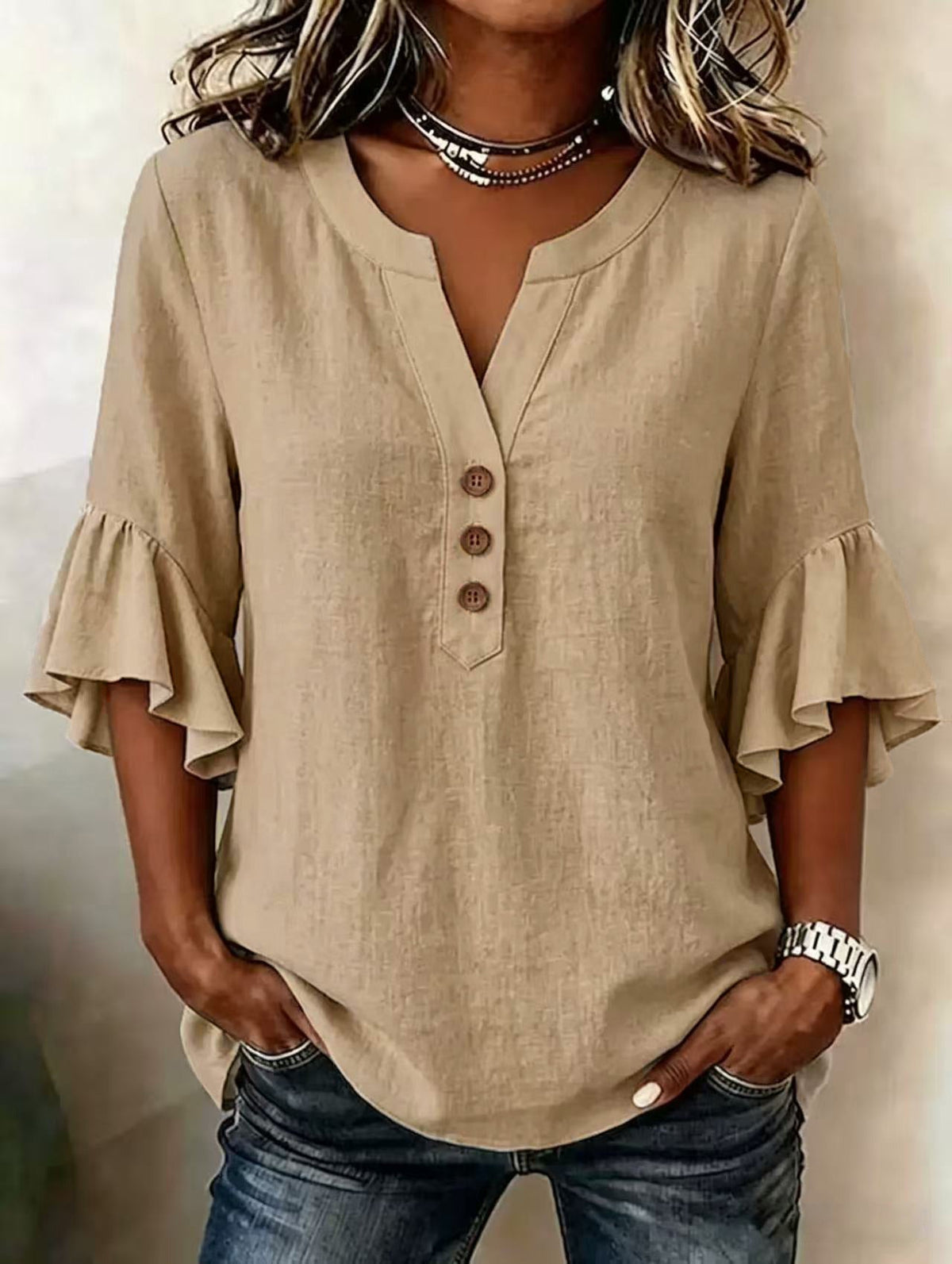 Relaxed Linen Blouse with Ruffle Sleeves and Button Neckline